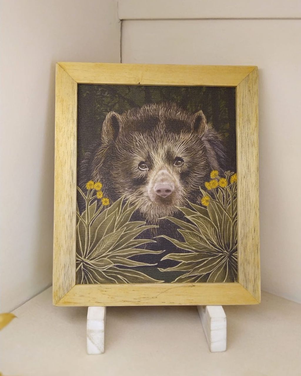 Lienzo con print de ave oso de anteojos enmarcado.