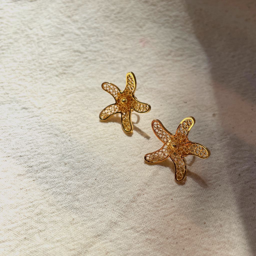 Topos de estrellita de mar en filigrana