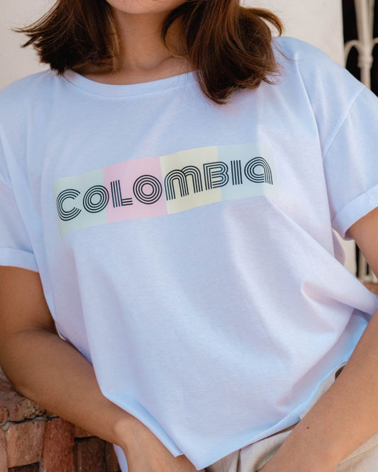T-Shirt Colombia de colores con fondo Azul