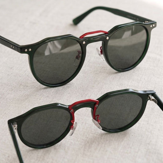 Gafas Premium en acetato verde con puente rojo